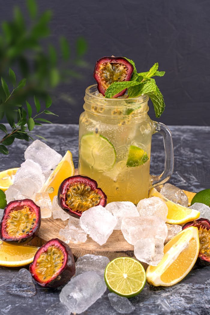 Sliced Lime and Passion Fruit on an Ice Cold Drink 